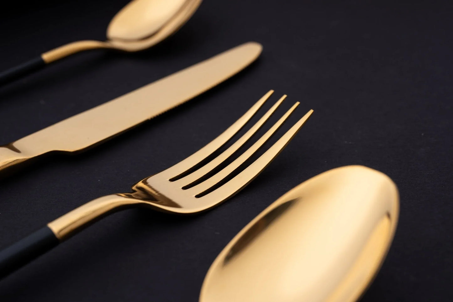 Premium 24 Piece Black and Gold Stainless Steel Cutlery Set - EvaCrock Pakistan