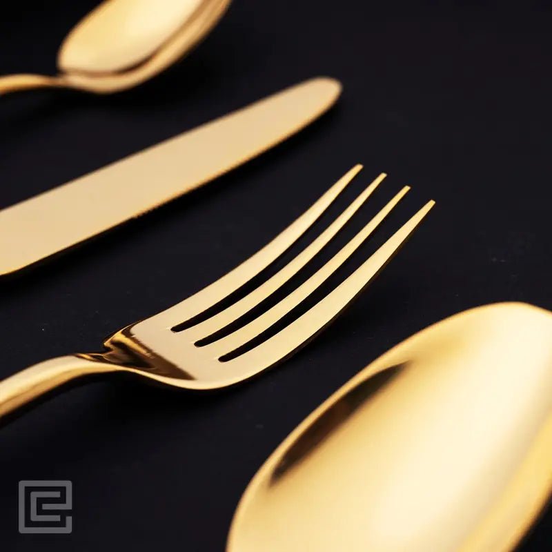 Premium 4 Pieces Black and Gold Stainless Steel Cutlery Set - EvaCrock Pakistan